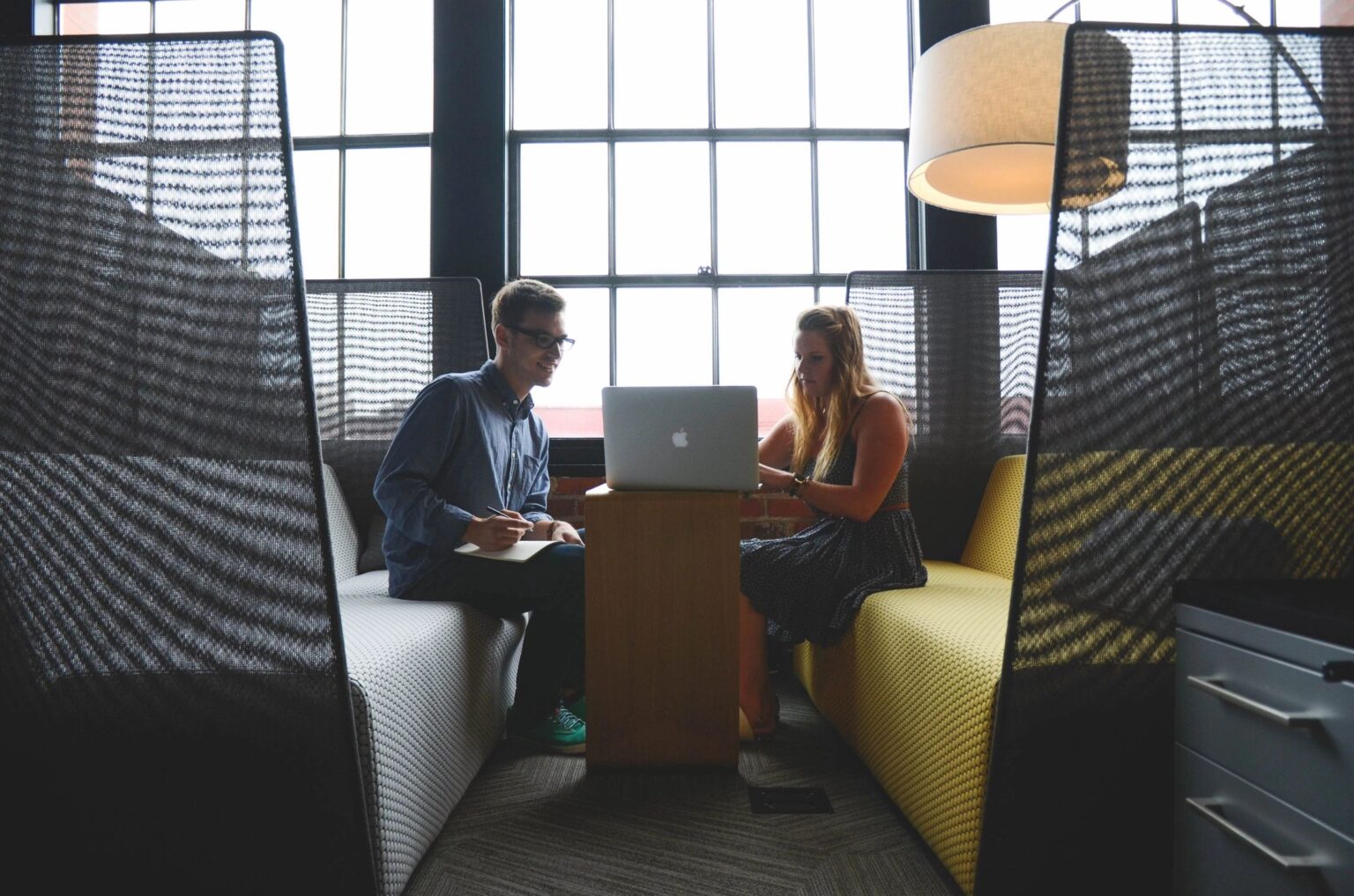 man and woman discussing